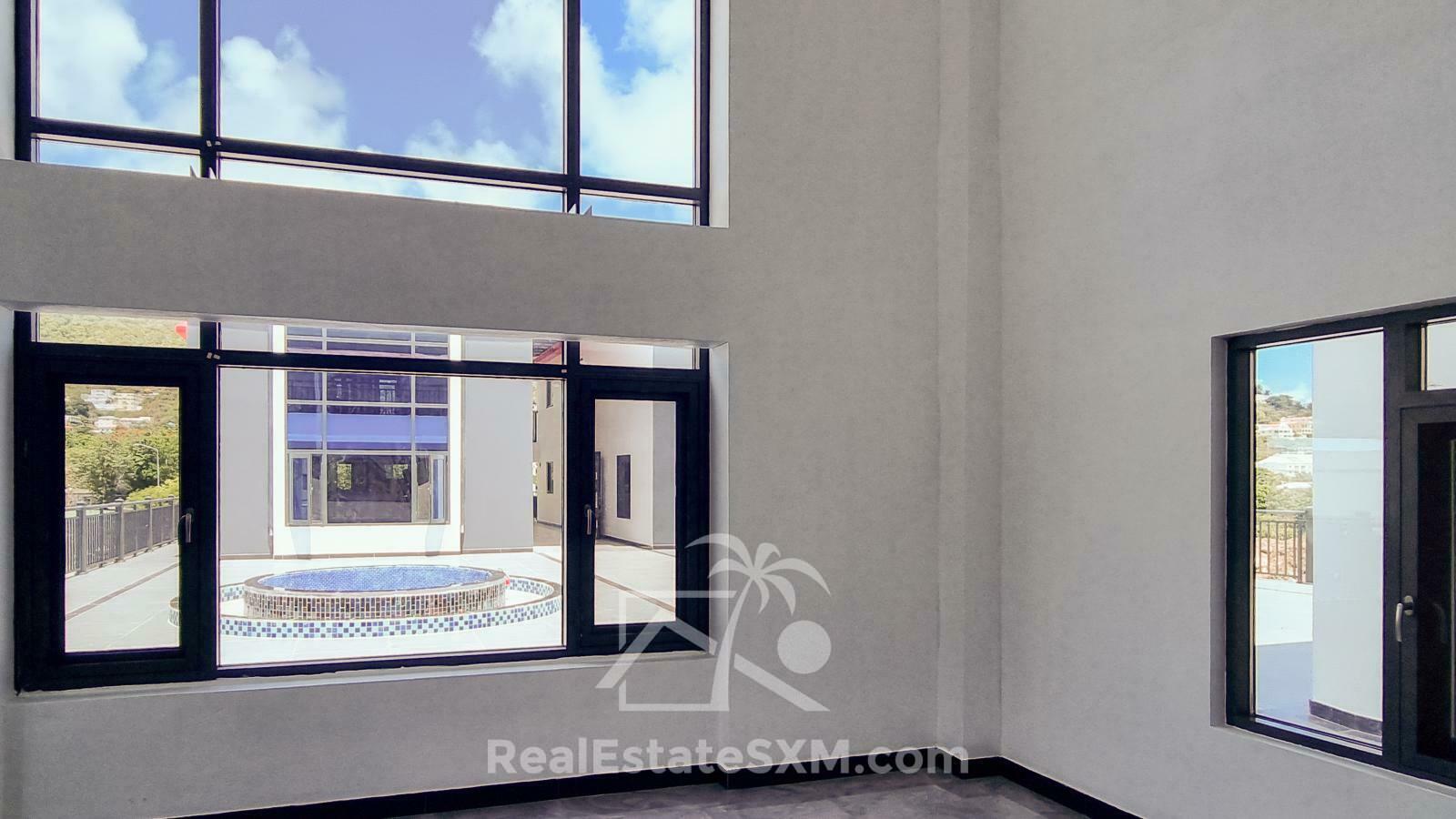 3-bedrooms condo in St Maarten, St John's. Brand new. Modern. Two levels. High ceilings