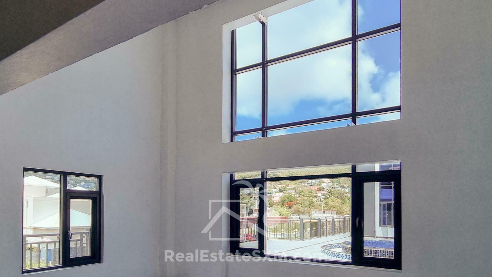 3-bedrooms condo in St Maarten, St John's. Brand new. Modern. Two levels. High ceilings