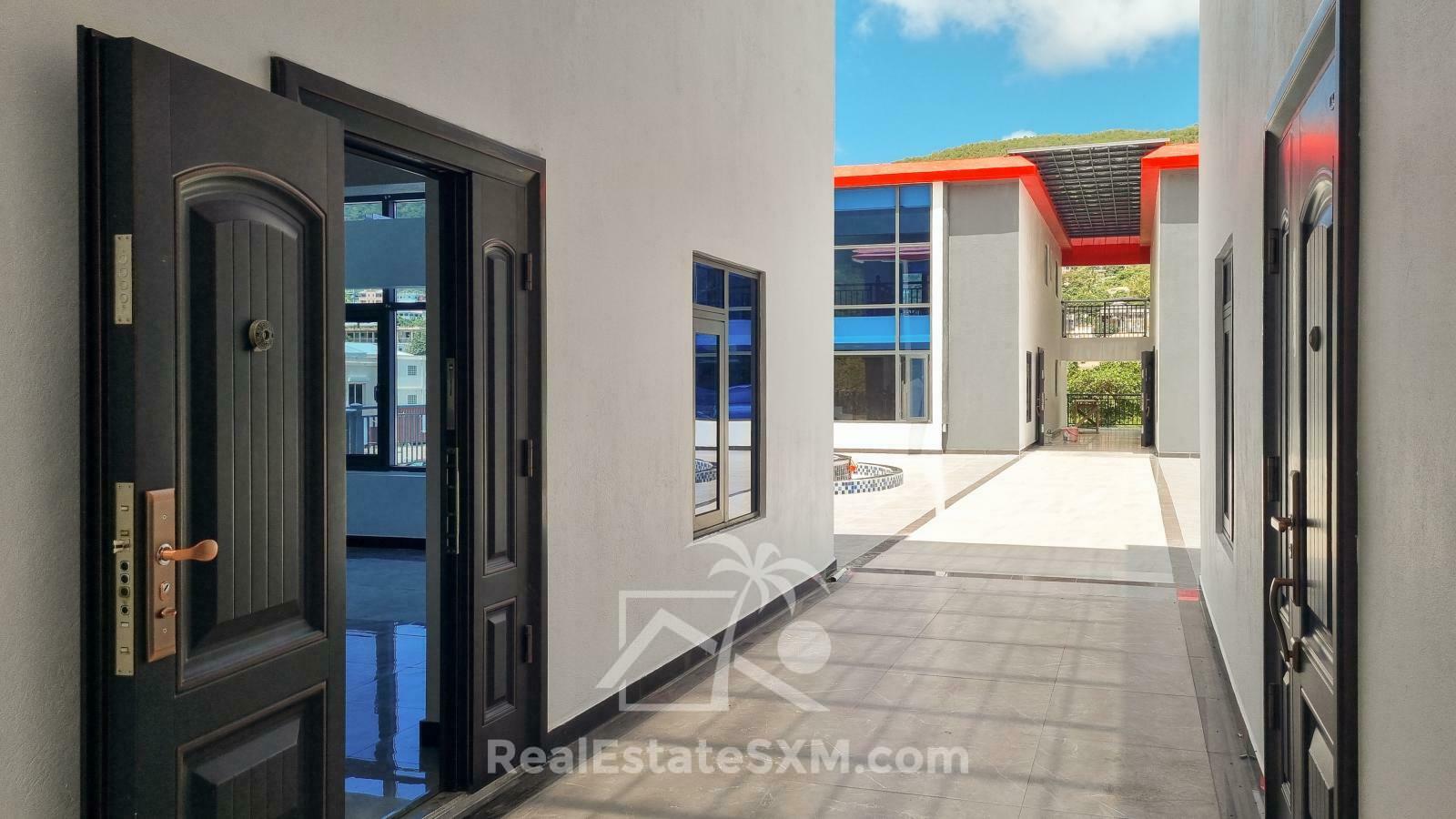 3-bedrooms condo in St Maarten, St John's. Brand new. Modern. Two levels. High ceilings