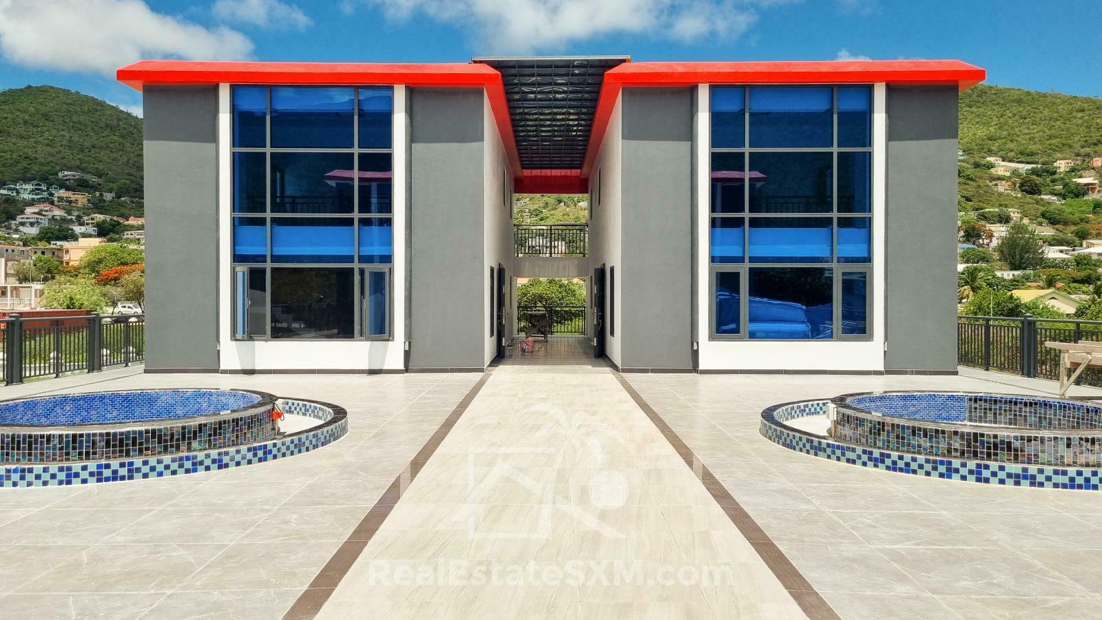 3-bedrooms condo in St Maarten, St John's. Brand new. Modern. Two levels. High ceilings
