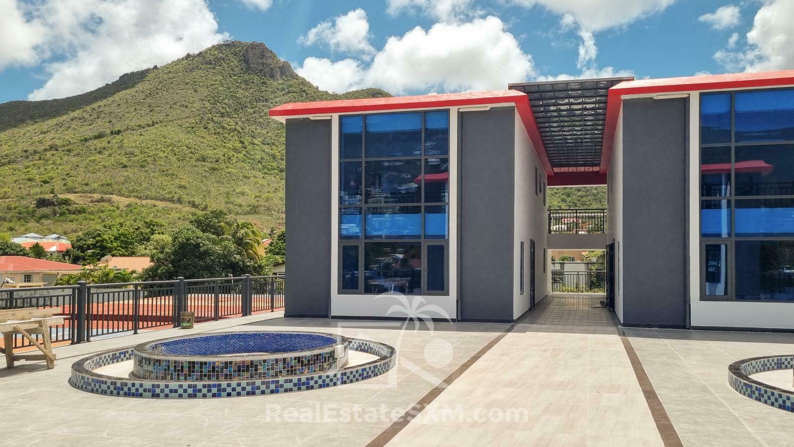 3-bedrooms condo in St Maarten, St John's. Brand new. Modern. Two levels. High ceilings
