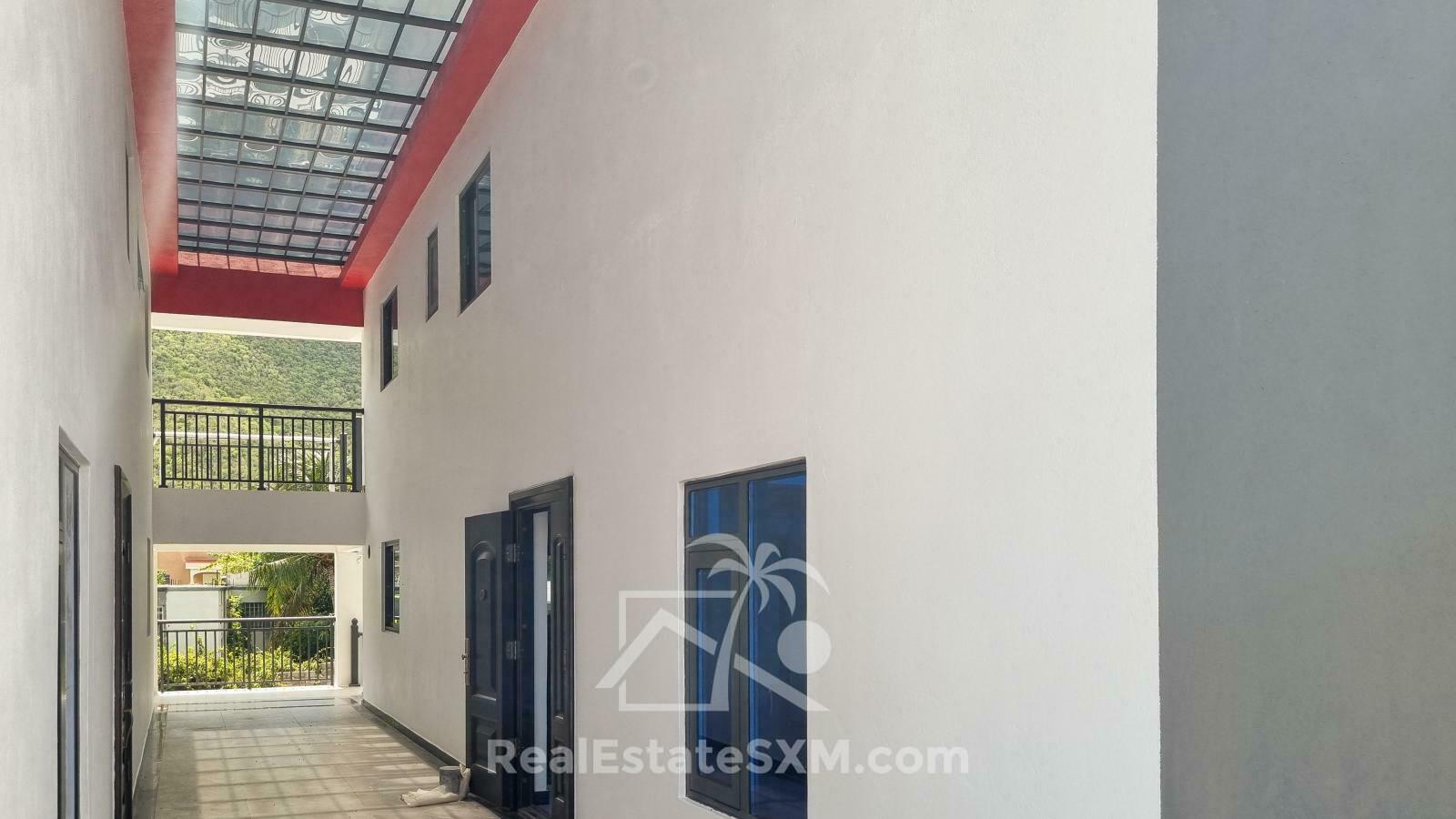3-bedrooms condo in St Maarten, St John's. Brand new. Modern. Two levels. High ceilings