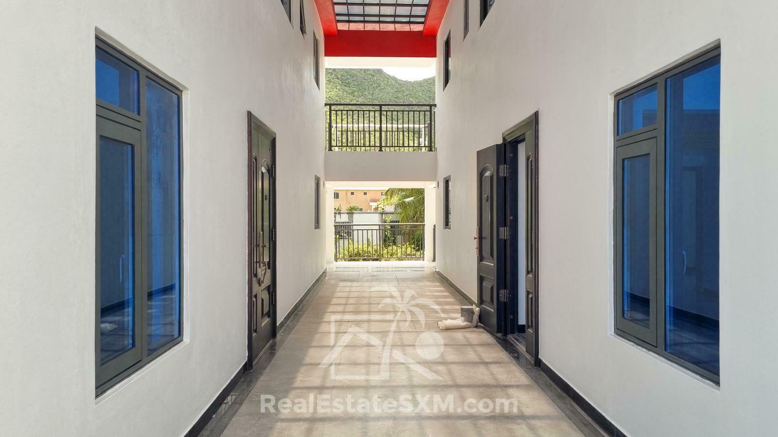 3-bedrooms condo in St Maarten, St John's. Brand new. Modern. Two levels. High ceilings