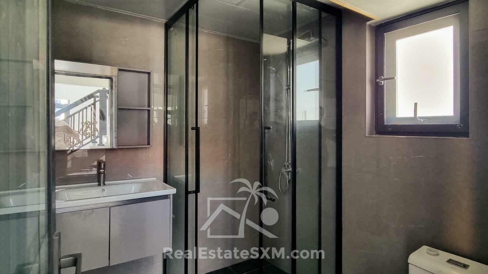 3-bedrooms condo in St Maarten, St John's. Brand new. Modern. Two levels. High ceilings