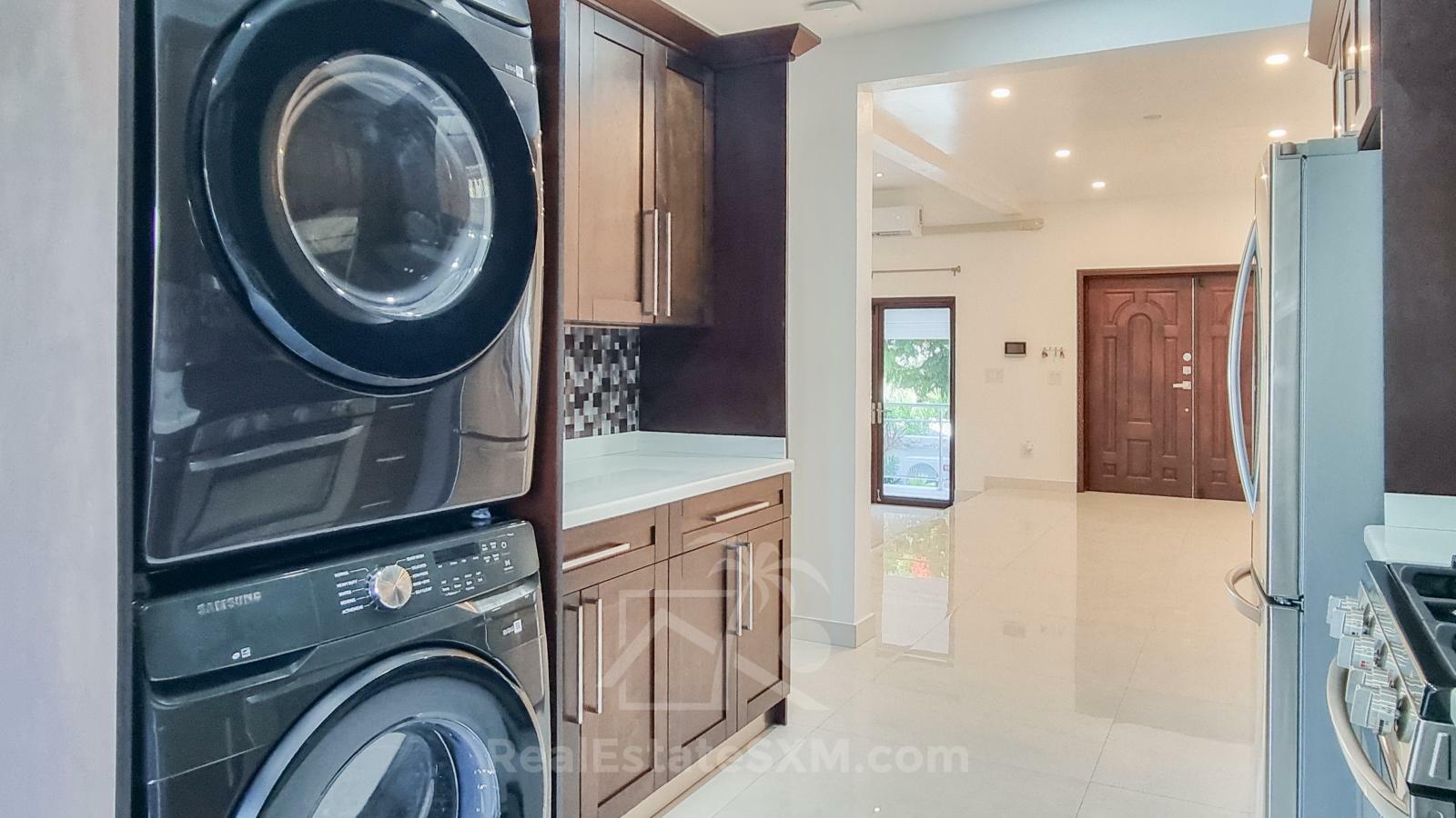 Cozy & luxury, hidden gem in the heart of Cole Bay 2-BR apartment. Swimming Pool. Gym. Renovated