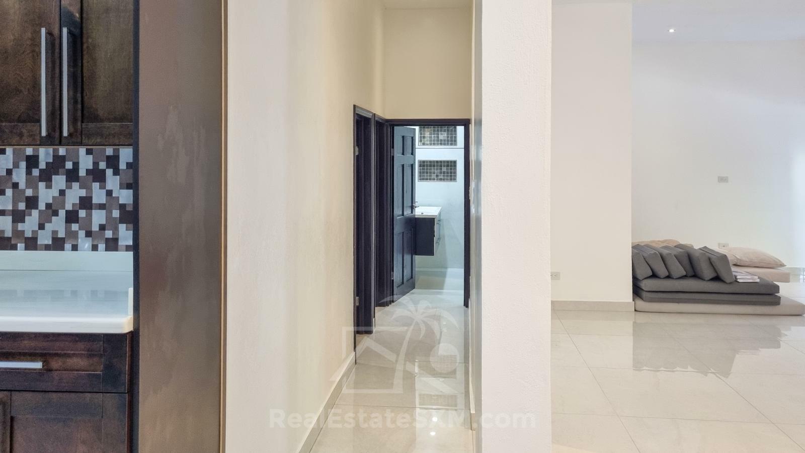 Cozy & luxury, hidden gem in the heart of Cole Bay 2-BR apartment. Swimming Pool. Gym. Renovated