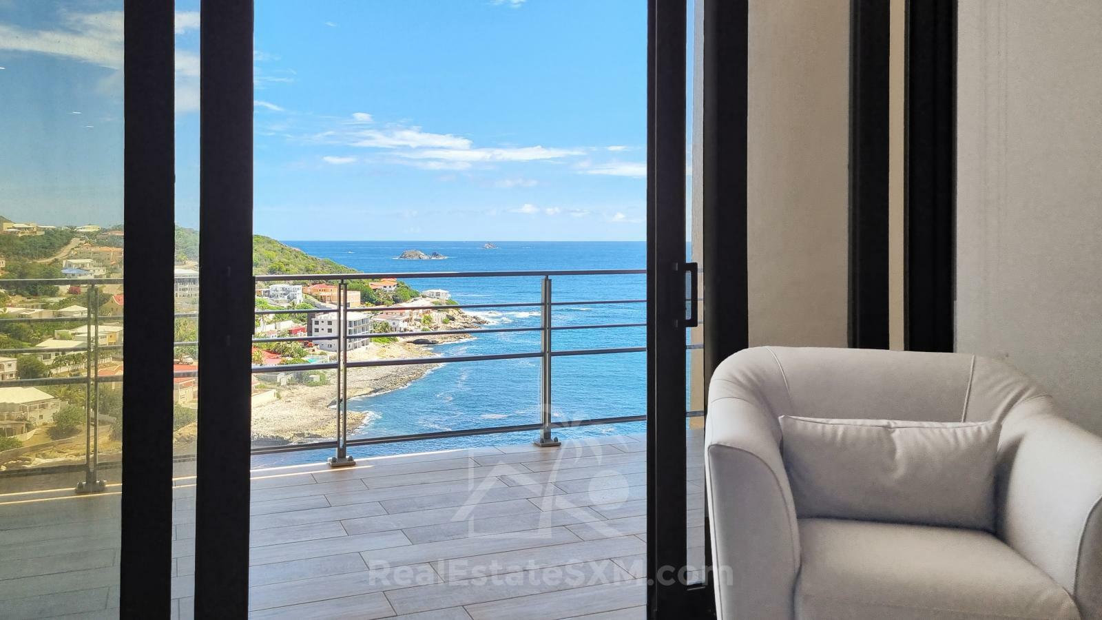 Caribbean Sunrises. 2-bedrooms for sale in SXM Point Blanche Lajas. Ocean View. Luxury. Furnished