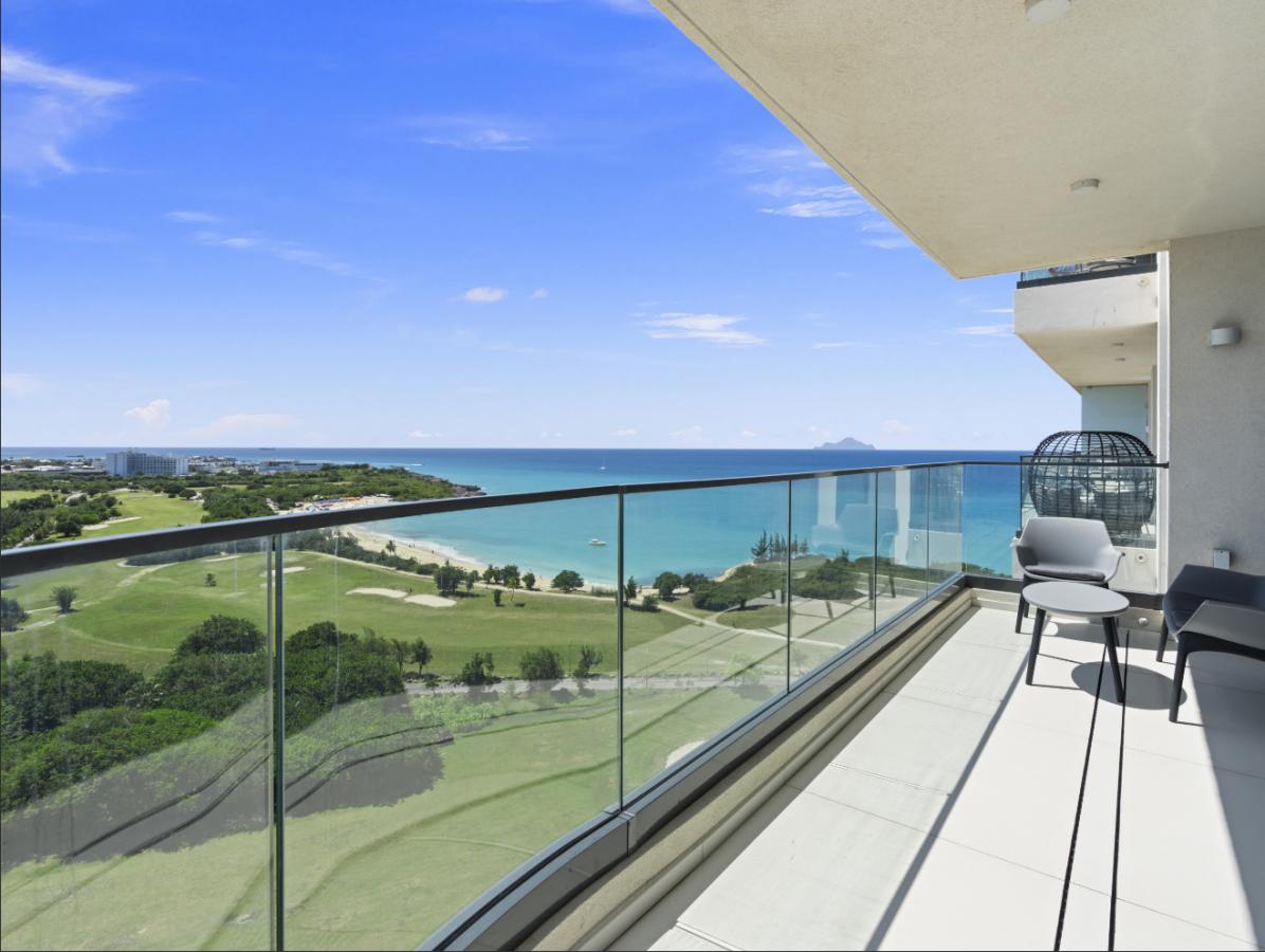 SXM Fourteen at Mullet Bay Beach 2-bedrooms condo FOR SALE. Ocean view. Sunsets. B-1403