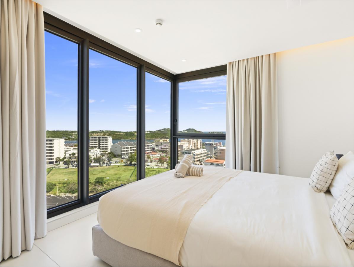 SXM Fourteen at Mullet Bay Beach 2-bedrooms condo FOR SALE. Ocean view. Sunsets. B-1403