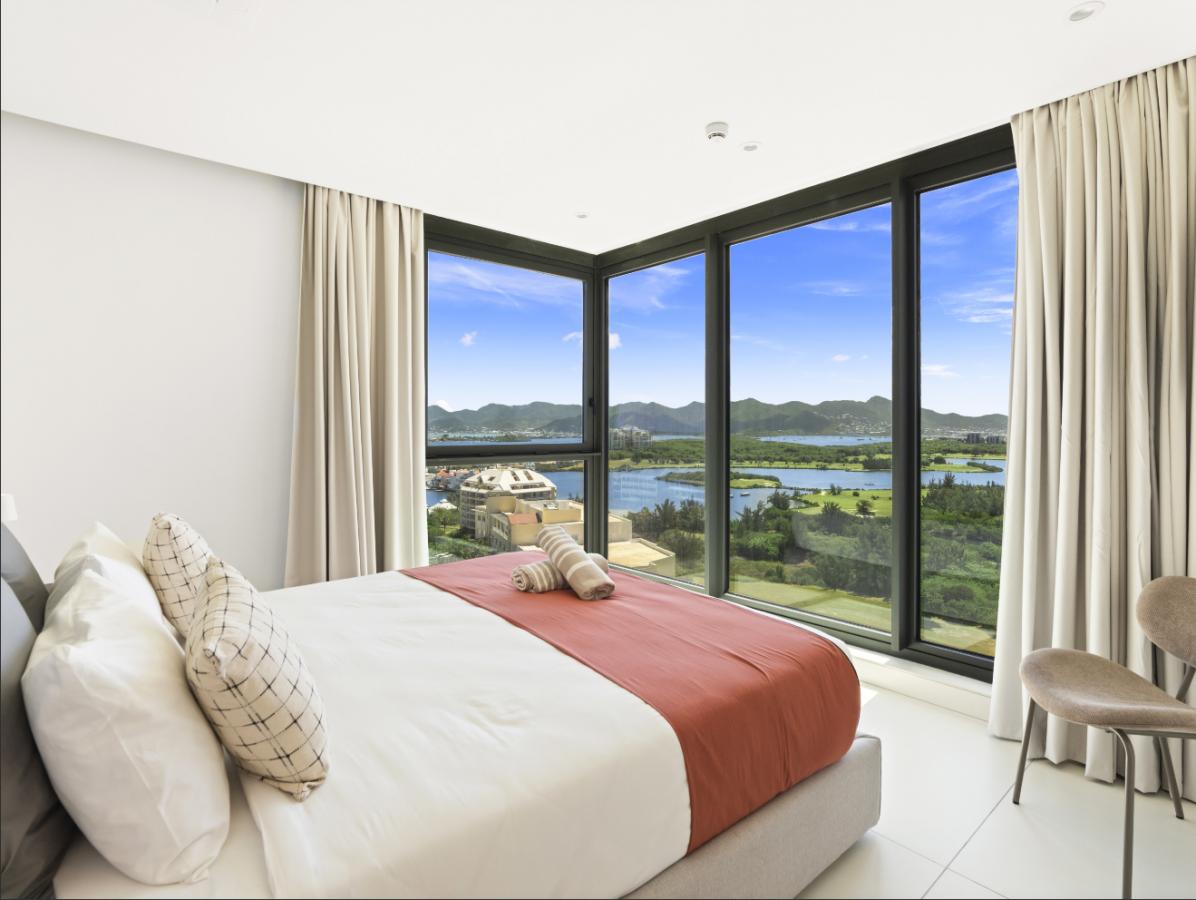 SXM Fourteen at Mullet Bay Beach 2-bedrooms condo FOR SALE. Ocean view. Sunsets. B-1403