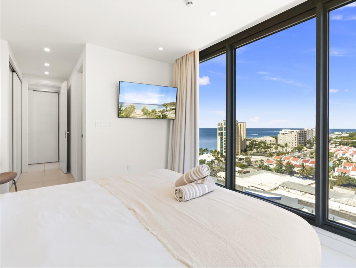 SXM Fourteen at Mullet Bay Beach 2-bedrooms condo FOR SALE. Ocean view. Sunsets. B-1403