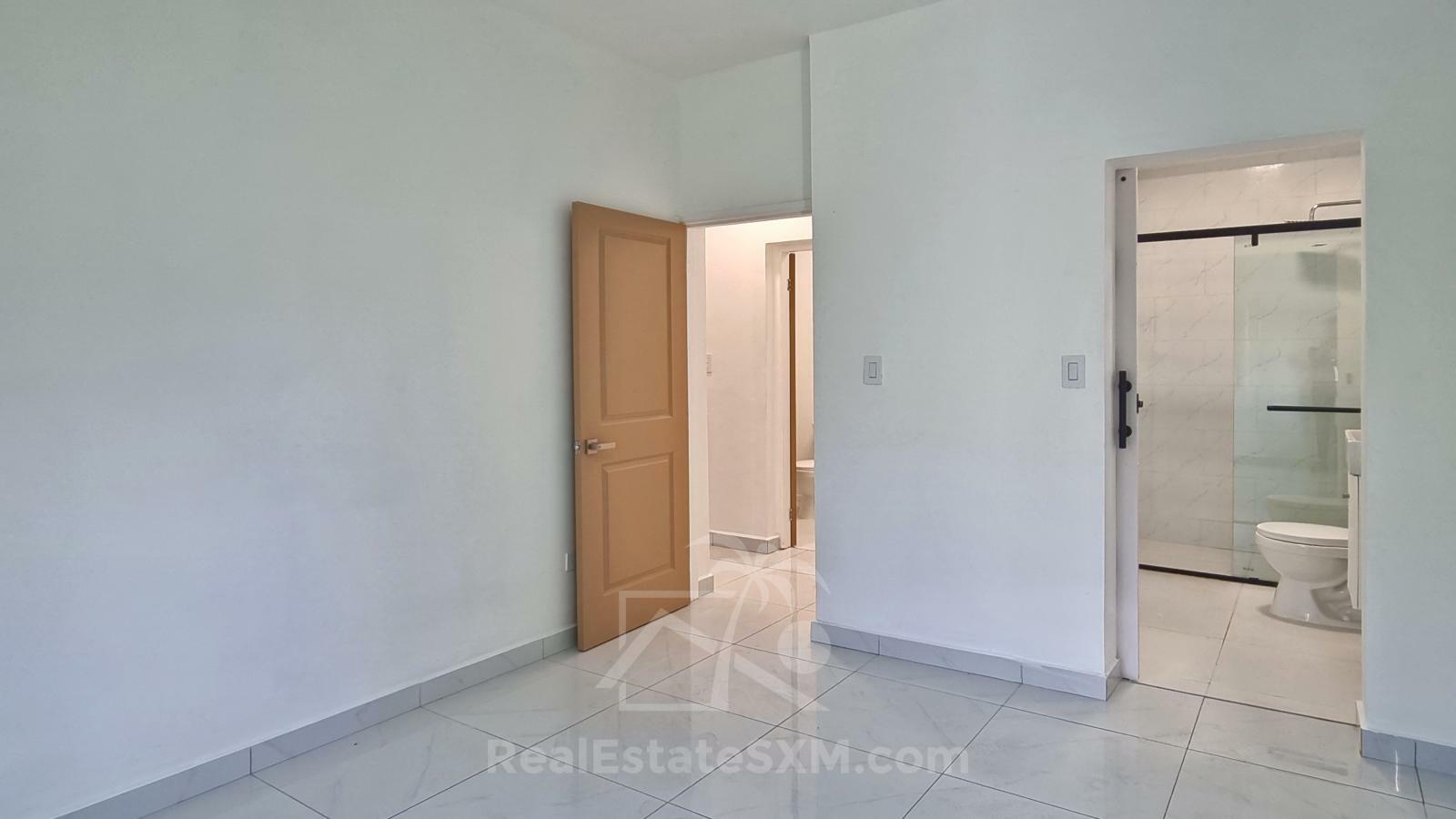 Cole Bay. Brand NEW apartment FOR RENT. Quiet and central location. 2 Parking spots. Porch