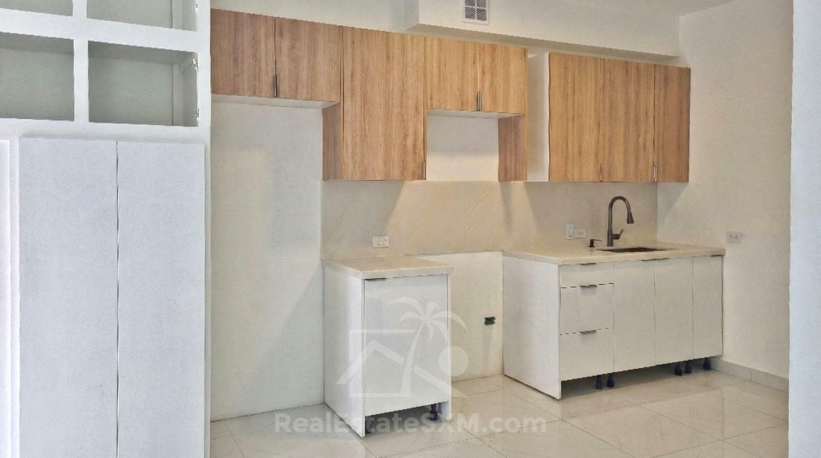 Cole Bay. Brand NEW apartment FOR RENT. Quiet and central location. 2 Parking spots. Porch