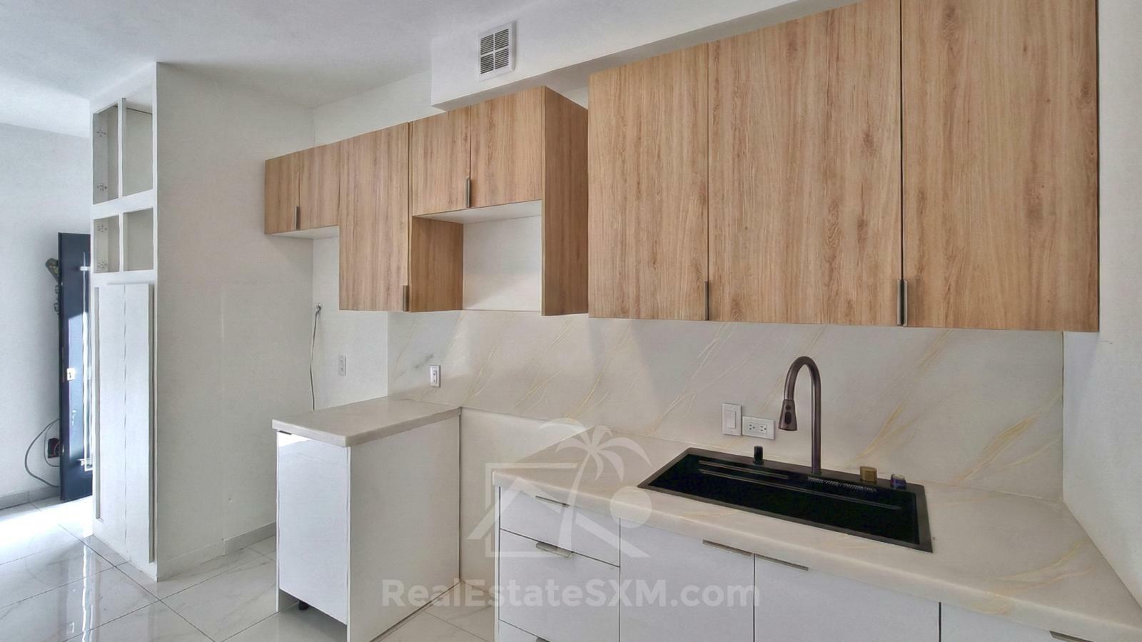 Cole Bay. Brand NEW apartment FOR RENT. Quiet and central location. 2 Parking spots. Porch