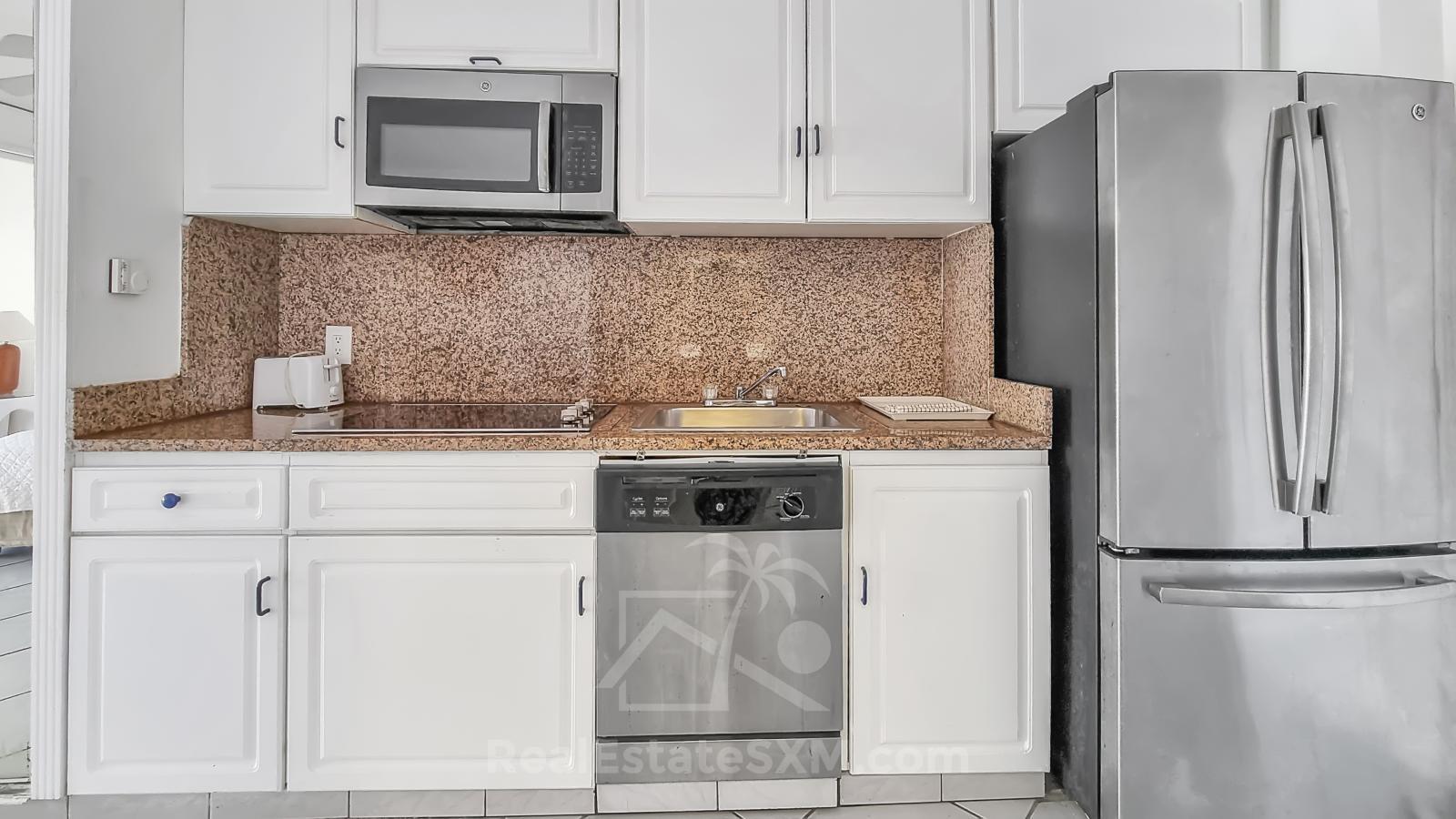 St Maarten Ocean View Home for sale in Cupecoy, Sapphire. Resort amenities. Sunsets. 211