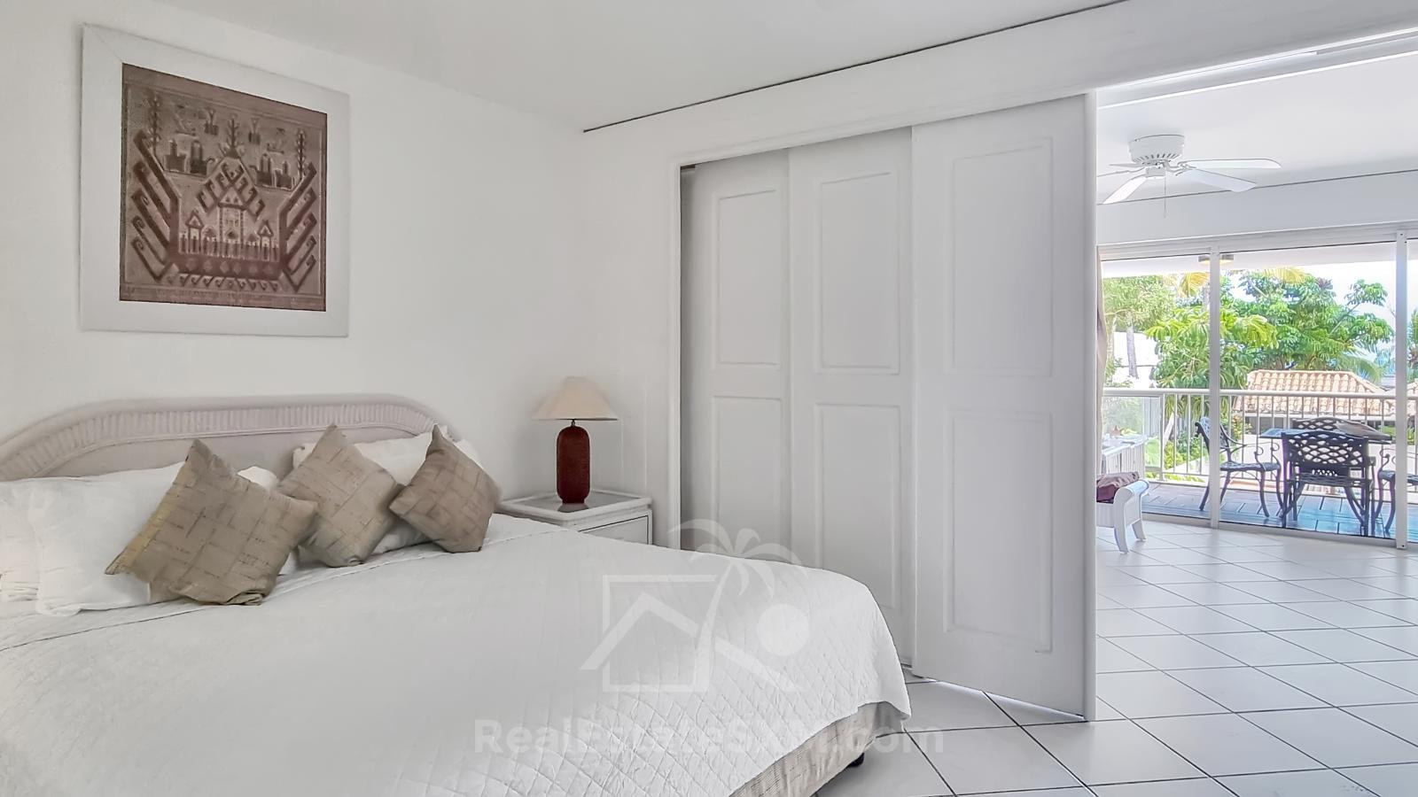St Maarten Ocean View Home for sale in Cupecoy, Sapphire. Resort amenities. Sunsets. 211