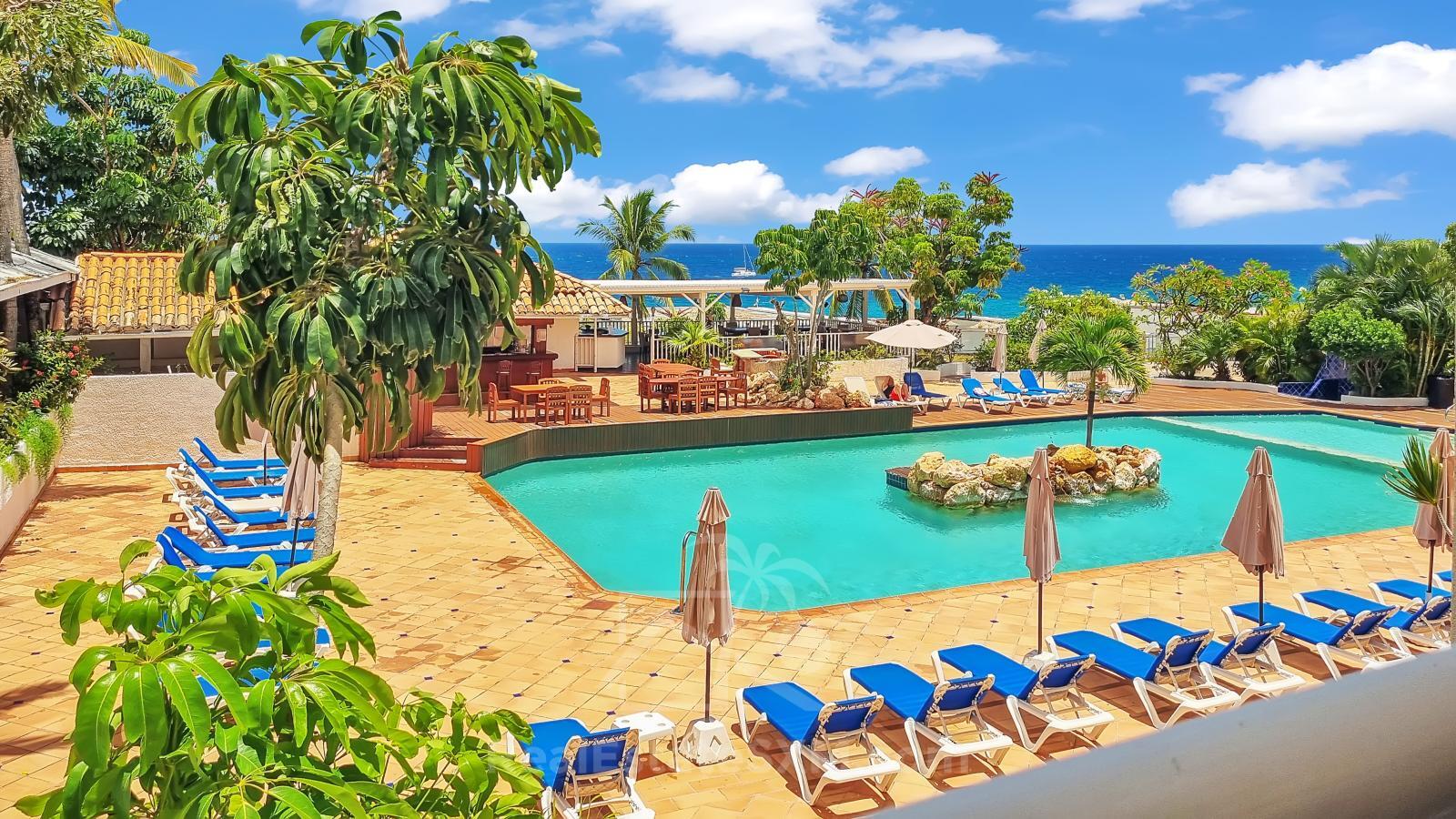 St Maarten Ocean View Home for sale in Cupecoy, Sapphire. Resort amenities. Sunsets. 211