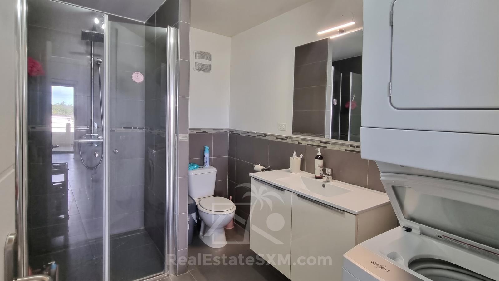 Studios for sale in St Maarten with Mezzanine & Lagoon Views – Jordan Village Cupecoy. Investment