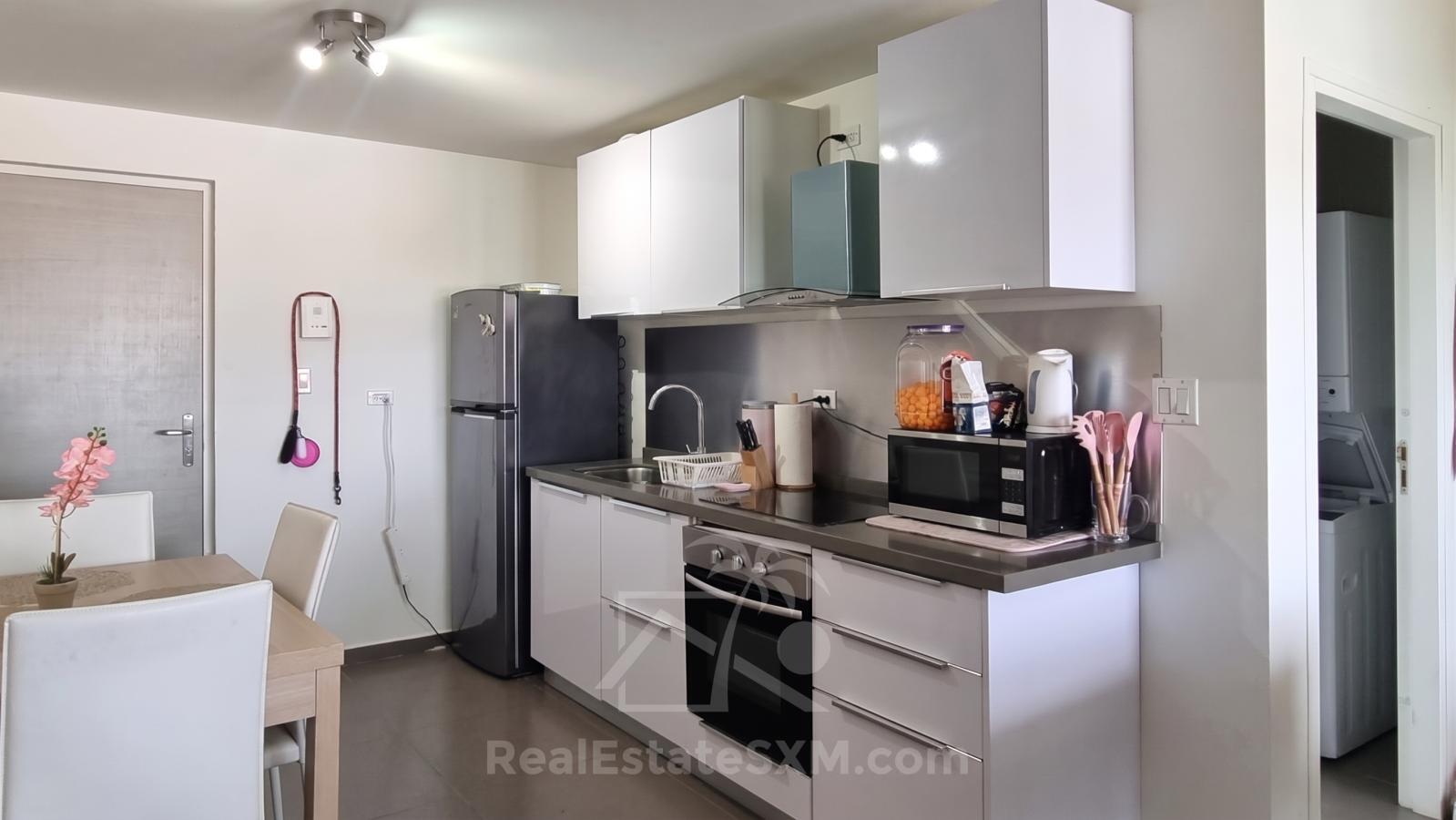 Studios for sale in St Maarten with Mezzanine & Lagoon Views – Jordan Village Cupecoy. Investment