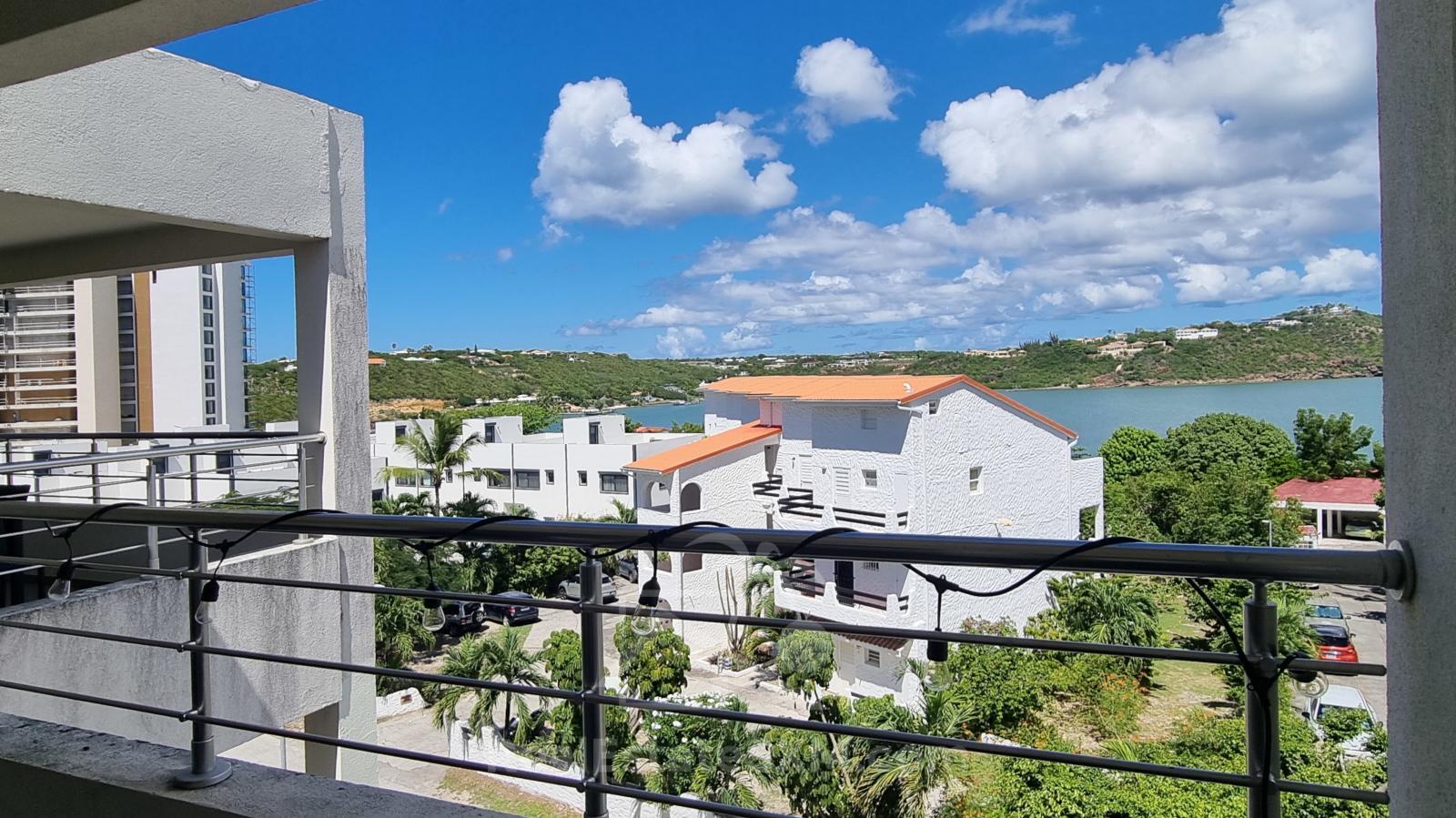 Studios for sale in St Maarten with Mezzanine & Lagoon Views – Jordan Village Cupecoy. Investment