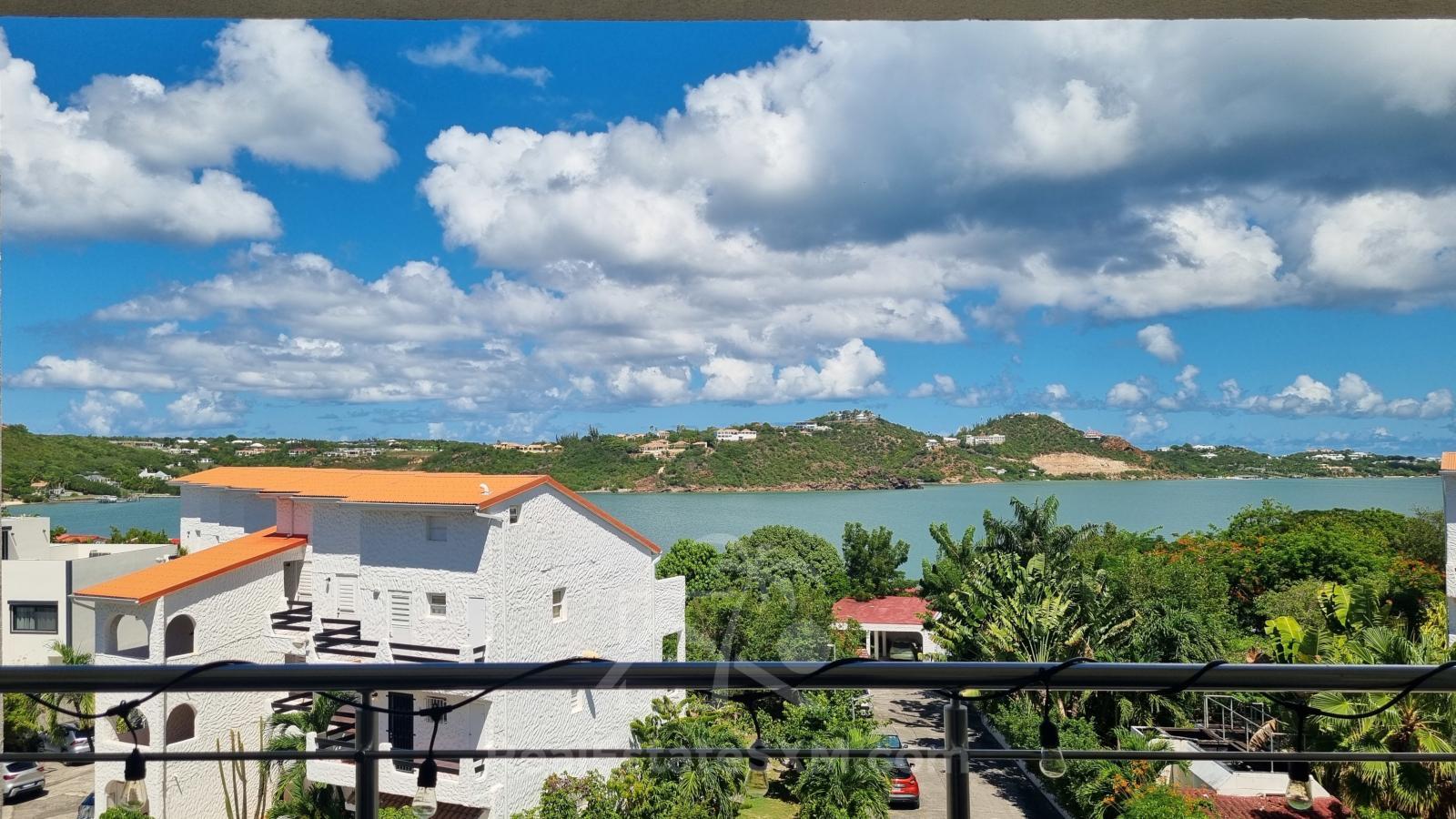 Studios for sale in St Maarten with Mezzanine & Lagoon Views – Jordan Village Cupecoy. Investment