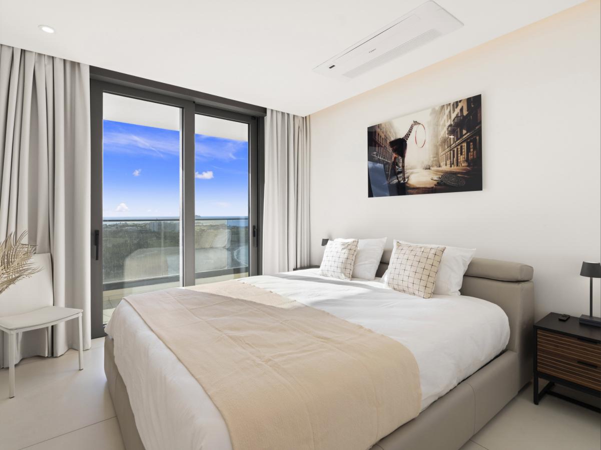 St Maarten Real Estate for sale 2 bedroom condo Fourteen at Mullet Bay, high floor view! B-1702