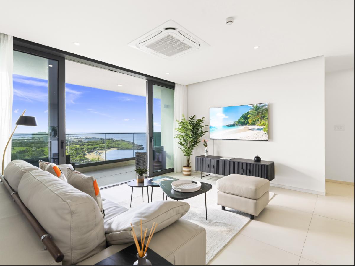 St Maarten Real Estate for sale 2 bedroom condo Fourteen at Mullet Bay, high floor view! B-1702