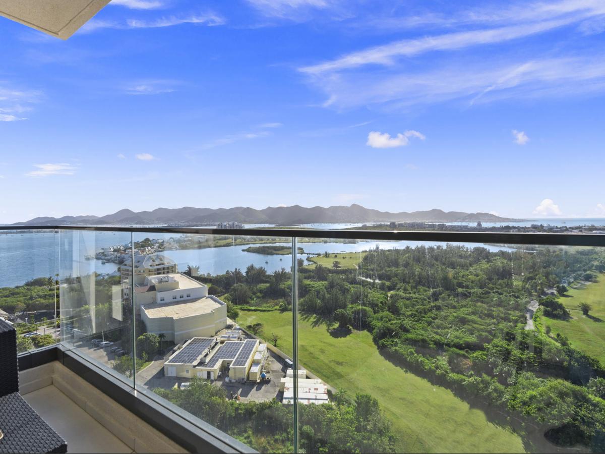 St Maarten Real Estate for sale 2 bedroom condo Fourteen at Mullet Bay, high floor view! B-1702