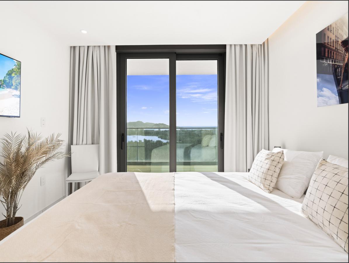 St Maarten Real Estate for sale 2 bedroom condo Fourteen at Mullet Bay, high floor view! B-1702