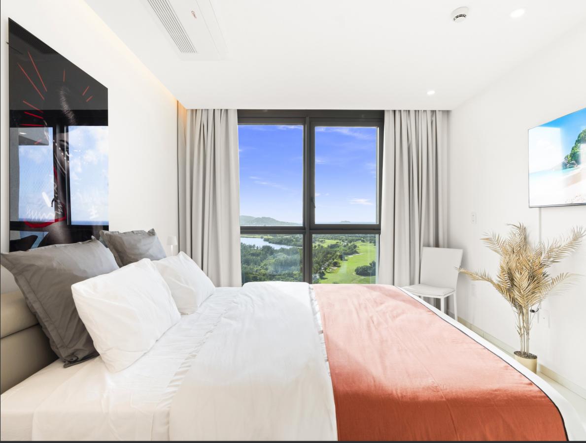 St Maarten Real Estate for sale 2 bedroom condo Fourteen at Mullet Bay, high floor view! B-1702