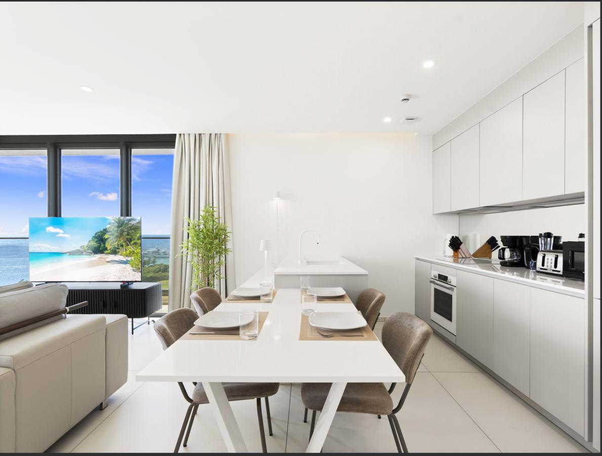 St Maarten home for sale: Spectacular 1BR Corner Ocean View Apartment — Fourteen, Cupecoy (B-802)