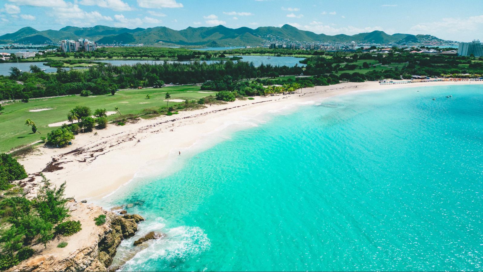 SXM Fourteen at Mullet Bay Beach 2-bedrooms condo FOR SALE. Ocean view. Sunsets. B-1403